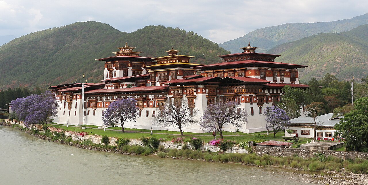 Punakha Dzong viewed across the Mo Chhu river, traditional Bhutanese fortress-monastery architecture